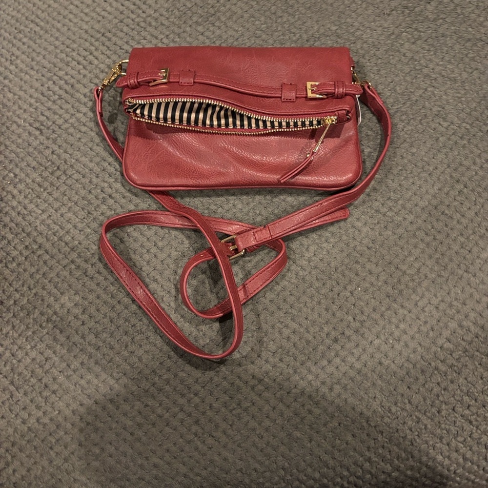 NWT Leather Crossbody Bag in a beautiful maroon color.